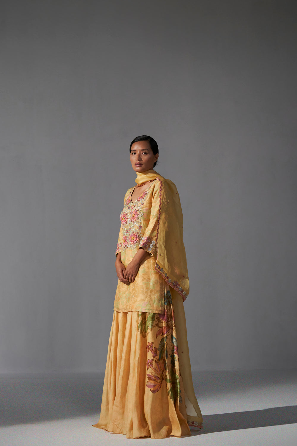 Yellow textured heavy top sharara dupatta set